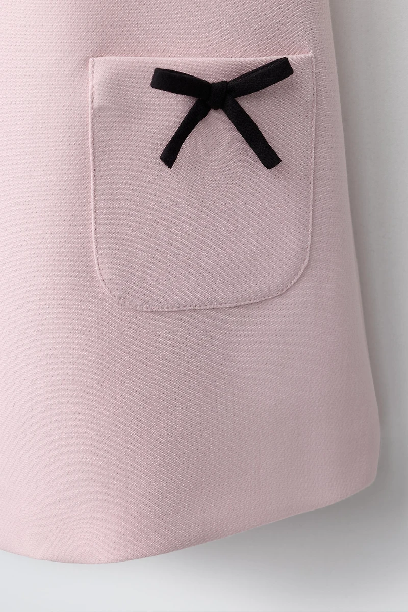 CONTRAST PIPING AND BOW DRESS