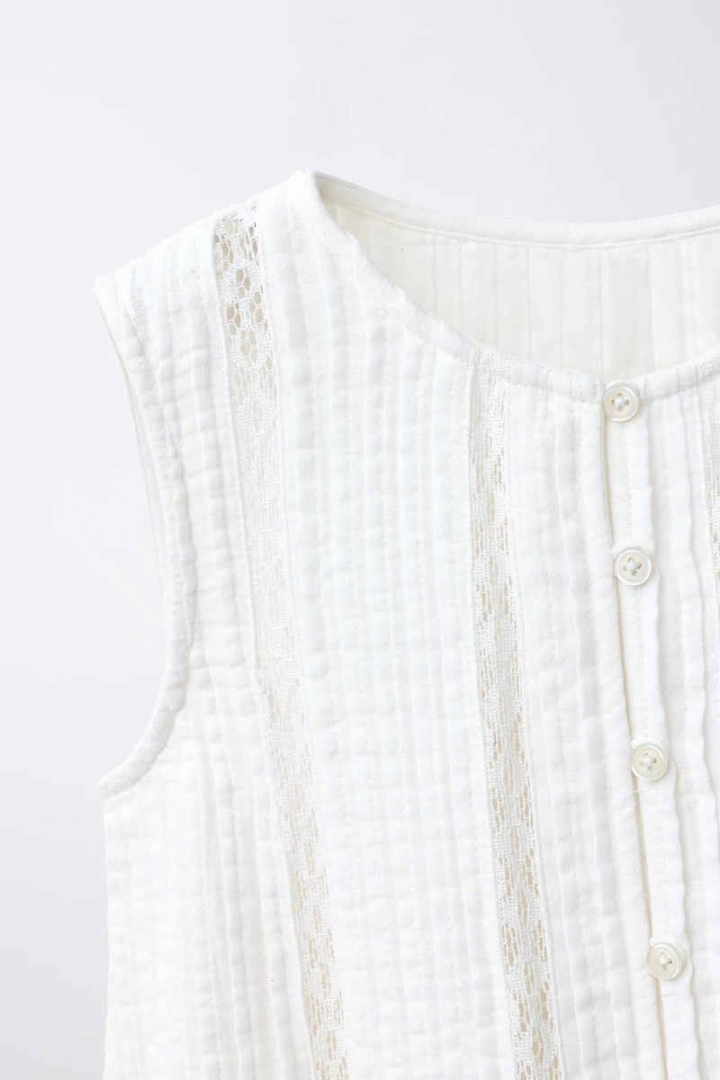 BLOUSE ENTRE-DEUX PLIS NERVURÉS