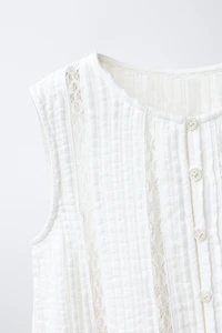BLOUSE ENTRE-DEUX PLIS NERVURÉS