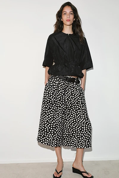 PANTALON JUPE-CULOTTE À POIS AVEC CEINTURE