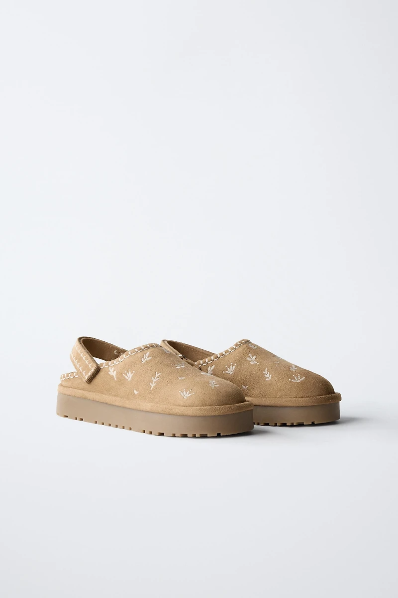 EMBROIDERED FAUX FUR CLOGS