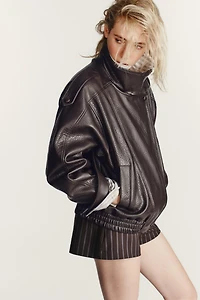 BLOUSON EN MATIÈRE SYNTHÈTIQUE