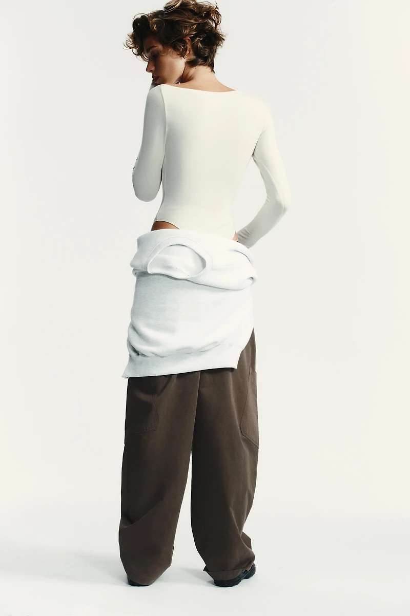 ASYMMETRIC LONG SLEEVE BODYSUIT