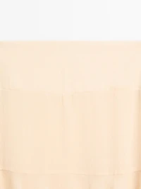 Long ruffled skirt with sash