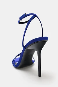 CRISS-CROSS STRAP HEELED SANDALS