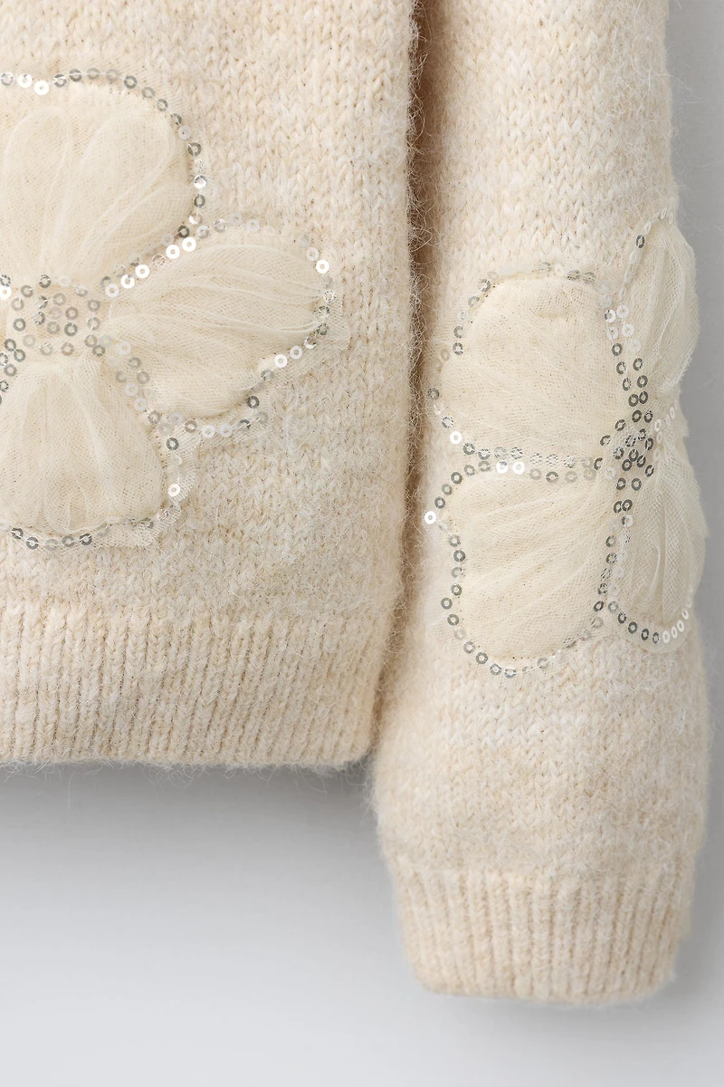PULL EN MAILLE À FLEURS, TULLE ET PAILLETTES