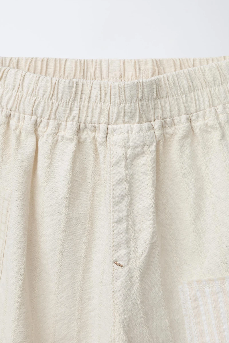 PANTALON BAGGY RUSTIQUE AVEC PIÈCES