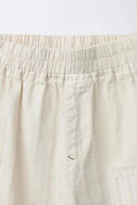 PANTALON BAGGY RUSTIQUE AVEC PIÈCES