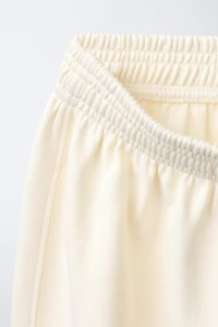 INTERLOCK WIDE LEG PANTS