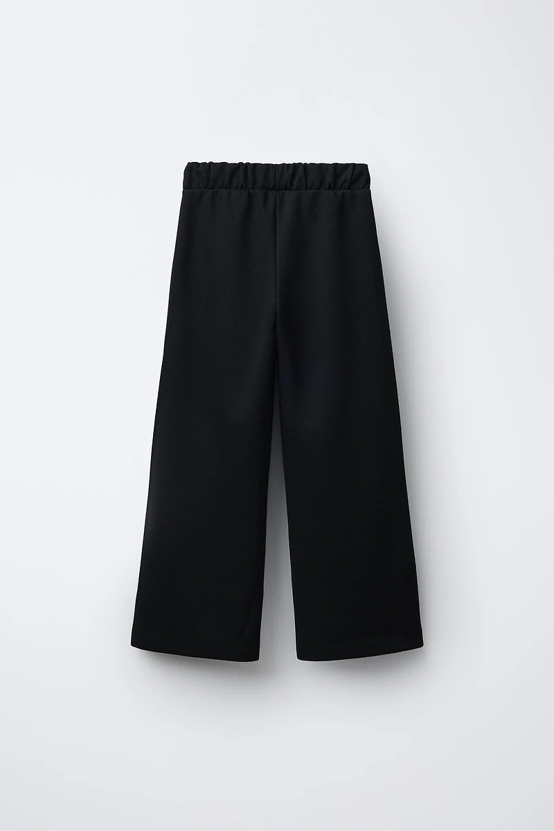 BUCKLED SUIT PANTS