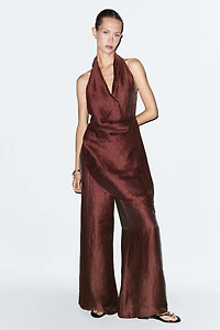 Flowing draped halter neck jumpsuit