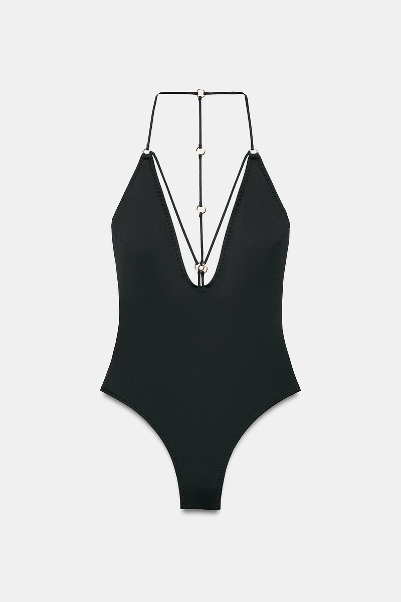 STRAPPY SWIMSUIT WITH EYELETS
