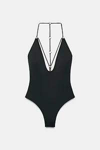 STRAPPY SWIMSUIT WITH EYELETS