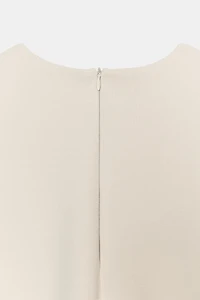 ASYMMETRIC INTERLOCK CAPE