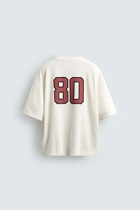 CONTRASTING PRINT TEXTURED T-SHIRT