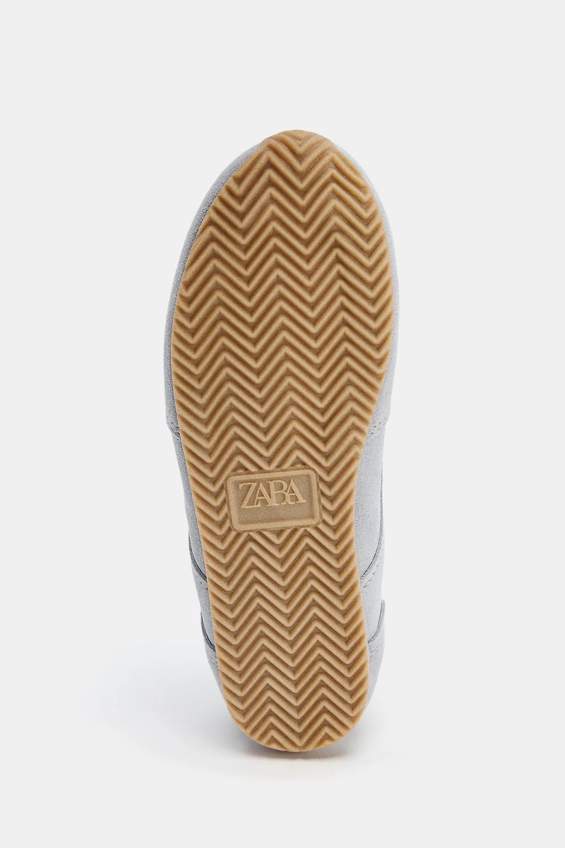 BASKETS EN CUIR CONTRASTÉES