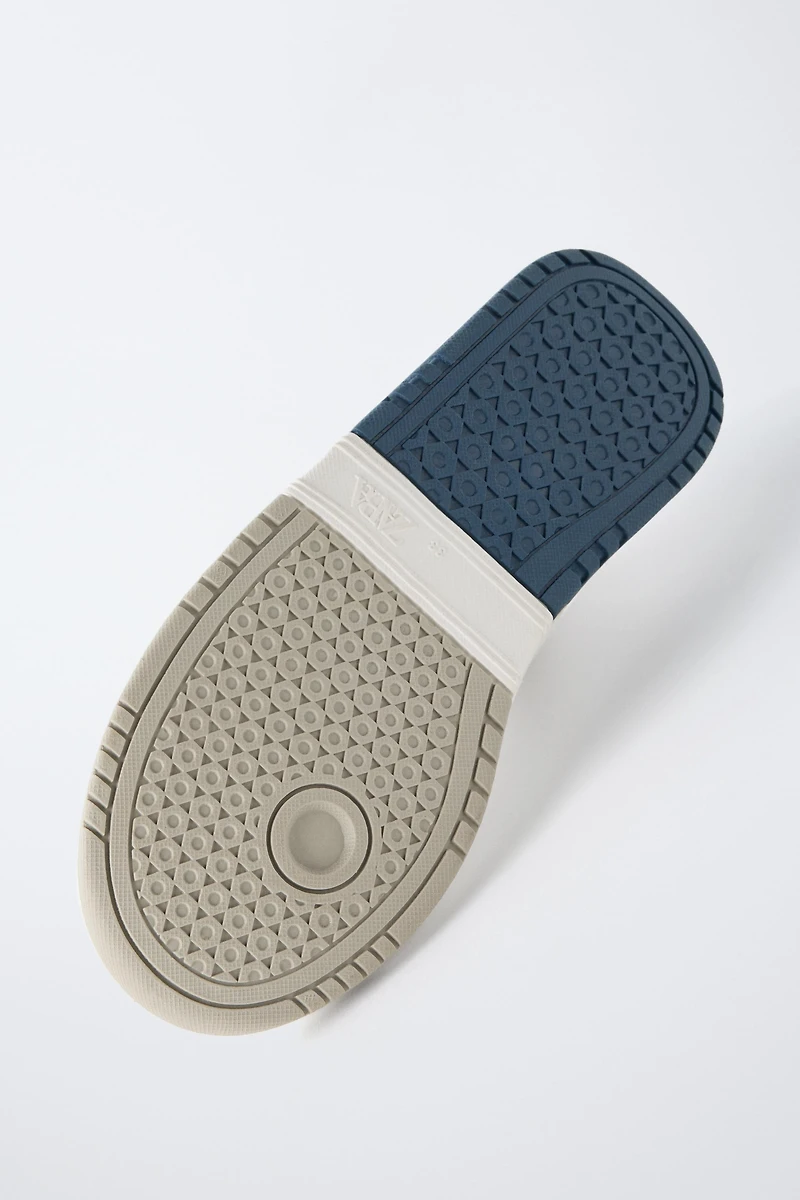 PIECED HIGH TOP SNEAKERS