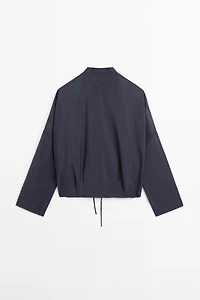 Stand collar bomber jacket with button details
