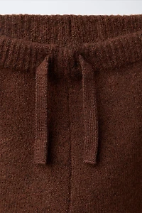 PANTALON DE JOGGING EN MAILLE AVEC CANARD BRODÉ