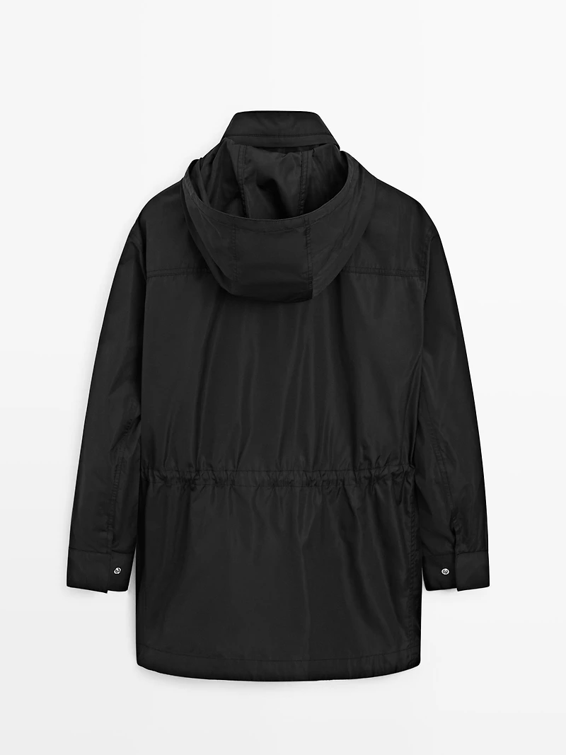 Hooded parka with fabric detail