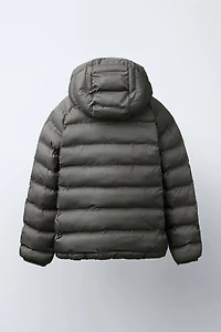 VESTE ULTRALÉGÈRE À CAPUCHE DÉPERLANTE