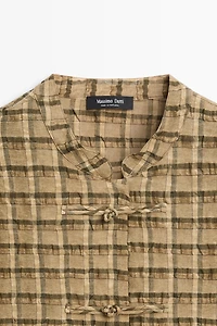 Flowing checkered shirt