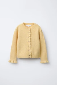 GILET EN MAILLE VOLANTS AVEC LAINE