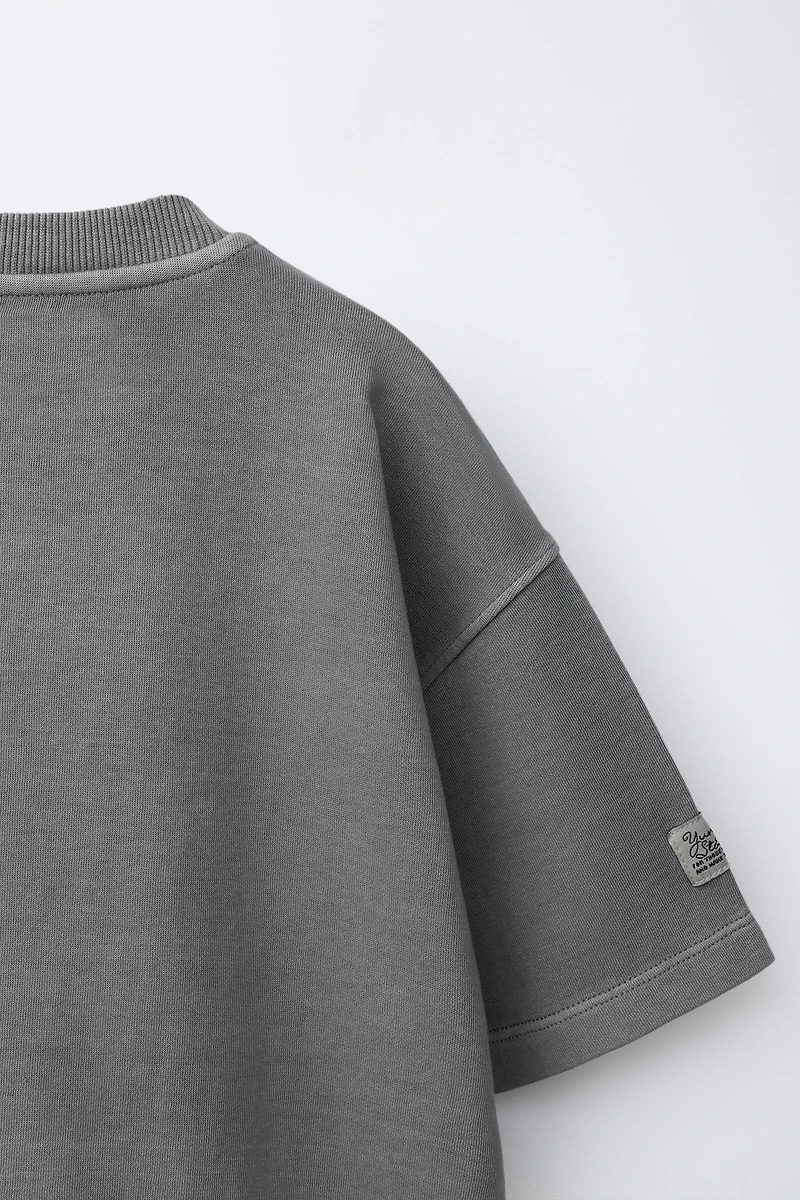 T-SHIRT INTERLOCK TEINT EN PIÈCE