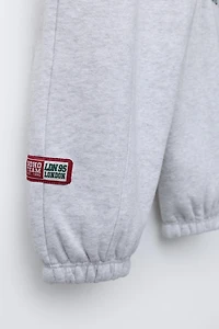 EMBROIDERED ANIMAL JOGGING PANTS
