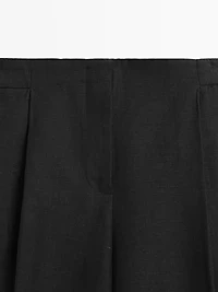 Flowing linen suit trousers