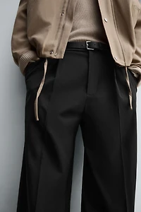 TEXTURED PLEATED PANTS