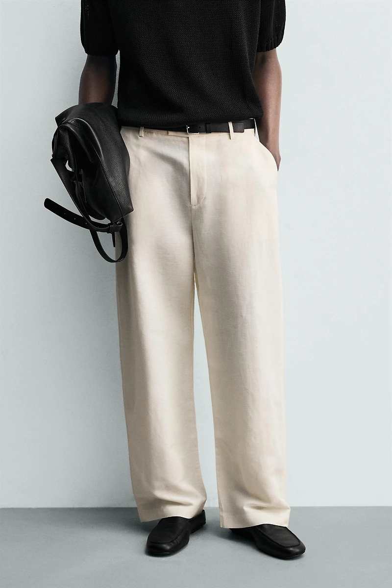 RELAXED FIT PLEATED PANTS