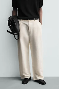 RELAXED FIT PLEATED PANTS