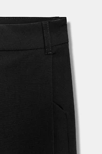 PLEATED LONG SHORTS