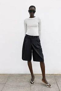 LONG PLEATED BERMUDA SHORTS