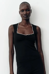 STRETCH TOP WITH METALLIC THREAD