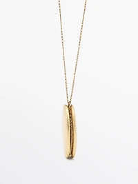 Necklace with metal piece