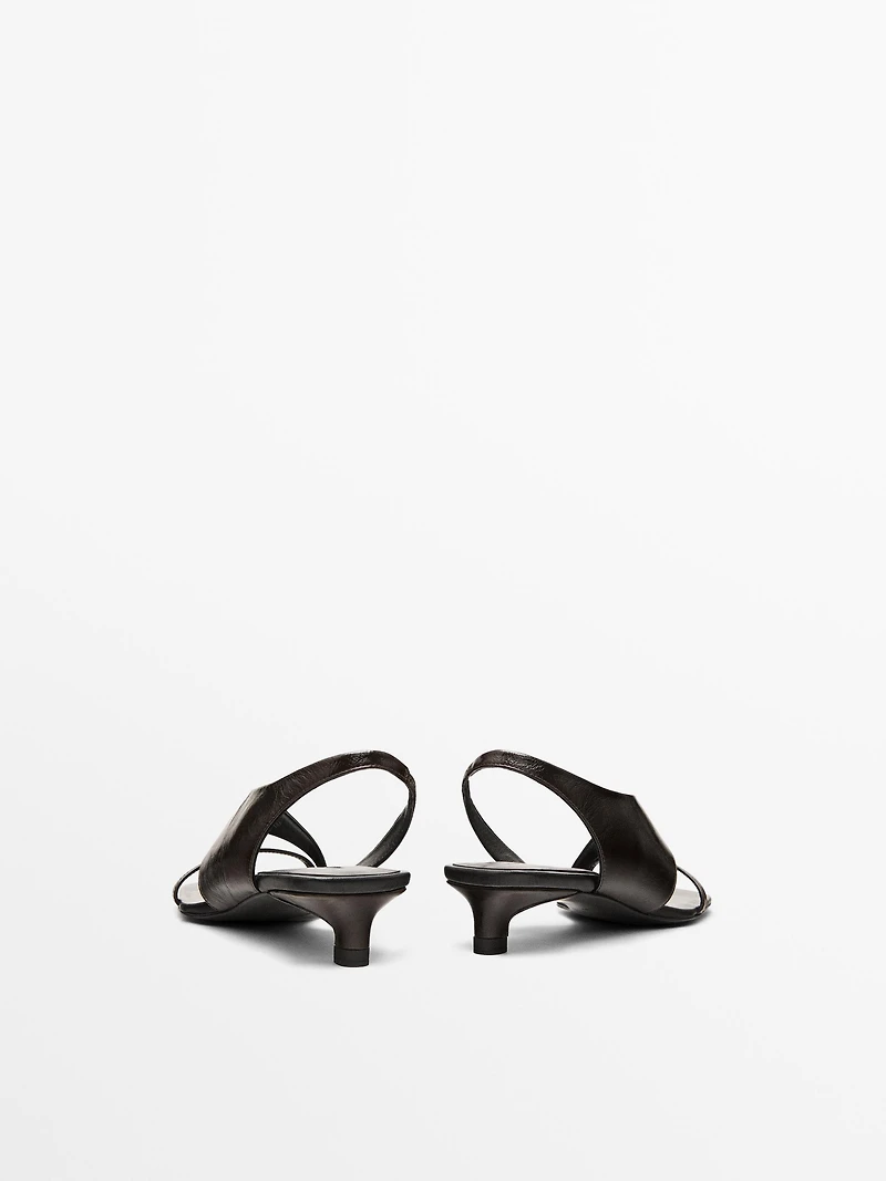 Asymmetric heeled sandals