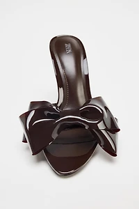BOW HEELED SANDALS