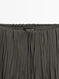 Long flowing pleated skirt