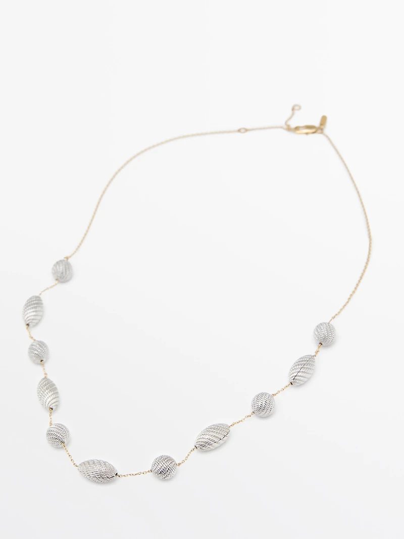 Collier texturé pièces ovales