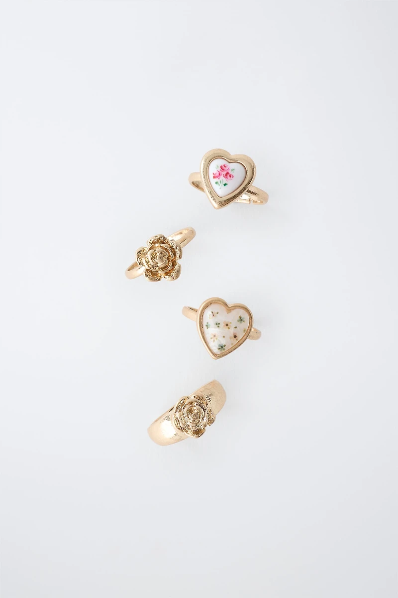 FOUR-PACK OF FLOWER AND HEART RINGS