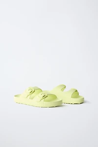 RUBBERIZED BUCKLED SANDALS