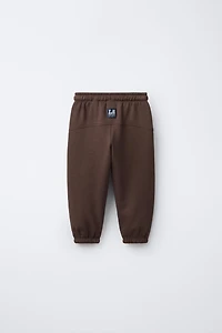 EMBROIDERED ANIMAL NUMBER JOGGING PANTS