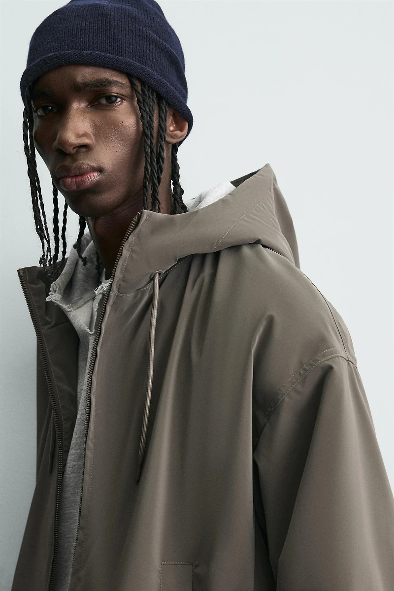 LIGHTWEIGHT HOODED TECHNICAL JACKET
