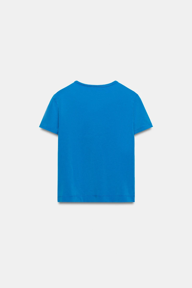 T-SHIRT TEXTE BRILLANT EFFET DÉLAV