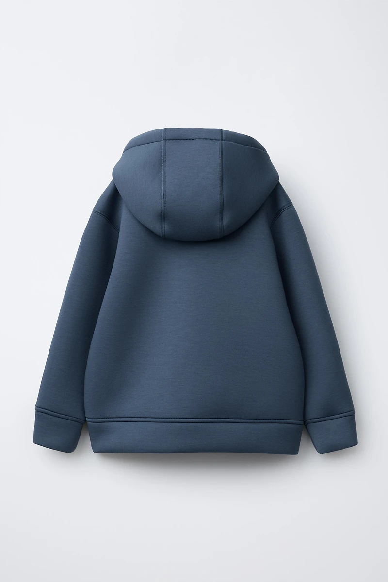 VESTE EFFET NÉOPRÈNE ÉTIQUETTE