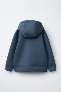 VESTE EFFET NÉOPRÈNE ÉTIQUETTE