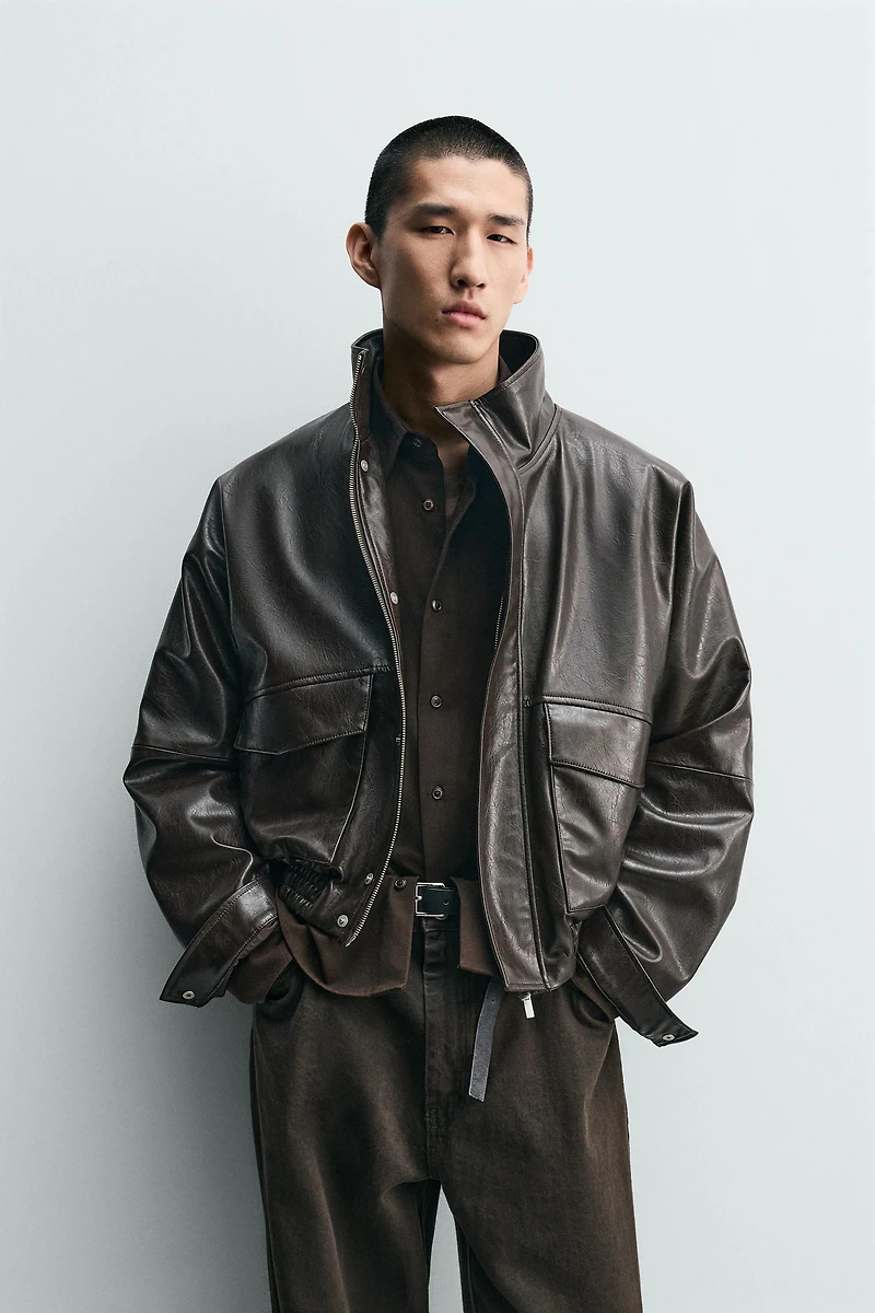 BLOUSON COURT MATIÈRE SYNTHÉTIQUE