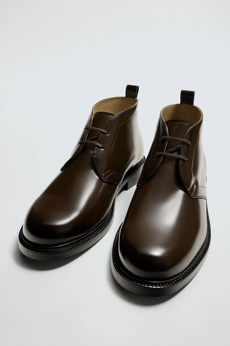 GLOSSY LEATHER BOOTS